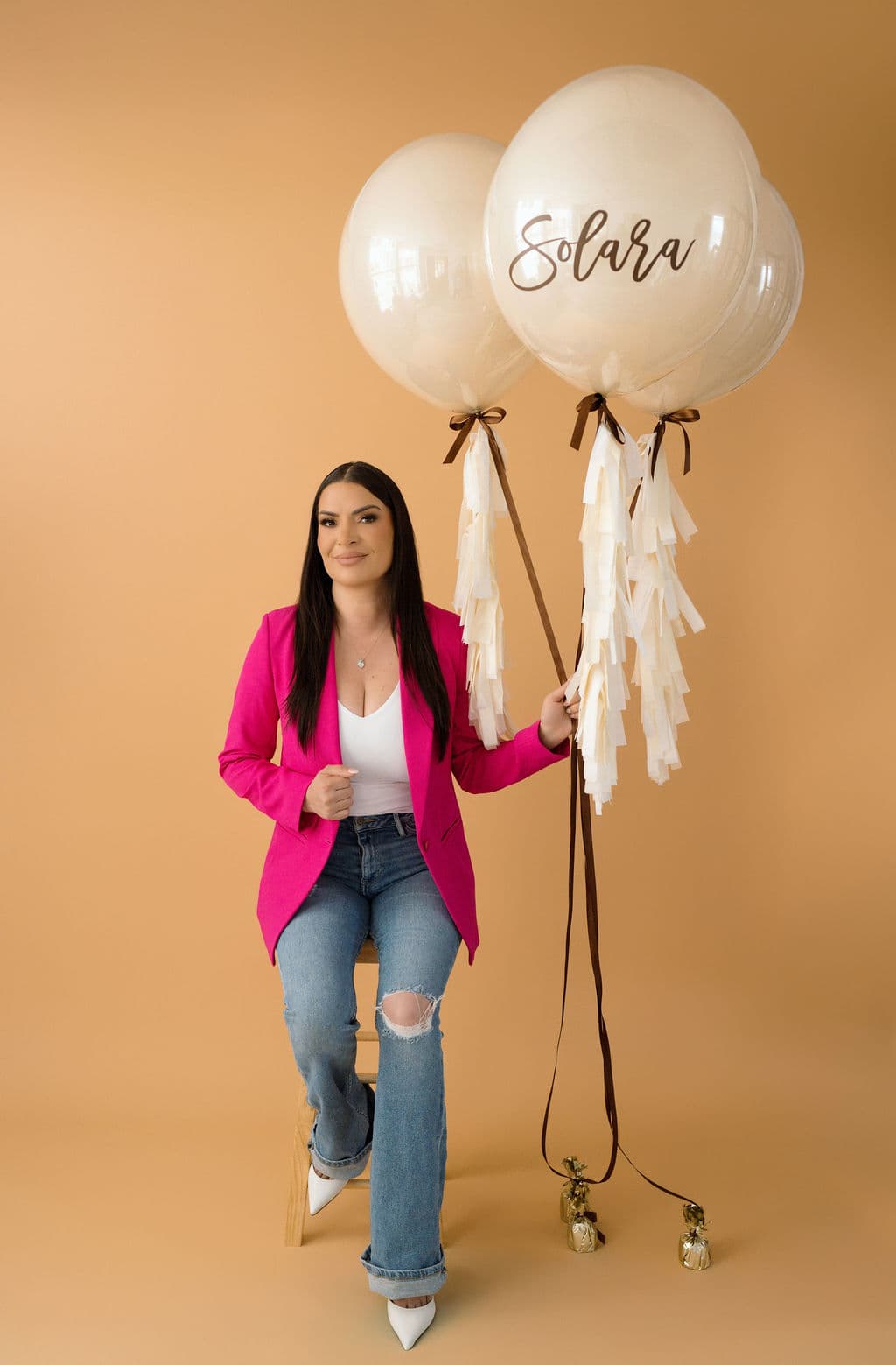 LOVE marquee letters glowing at an evening wedding reception
