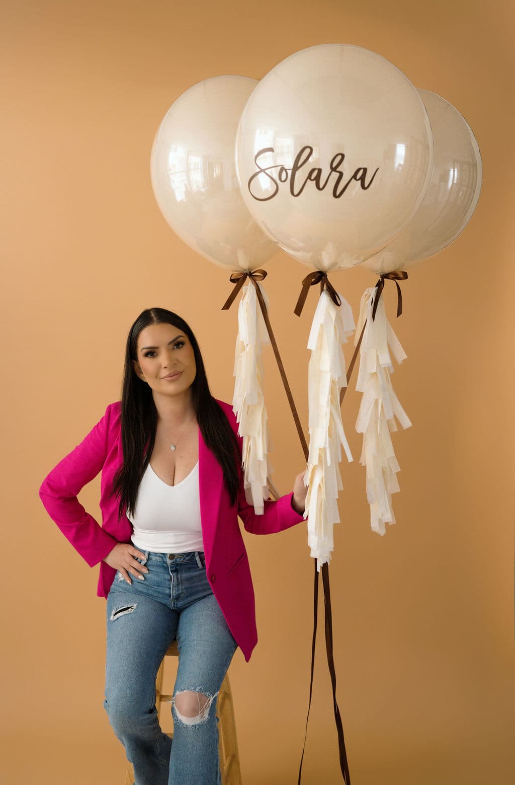 XV letters staged with florals for a quinceanera entrance