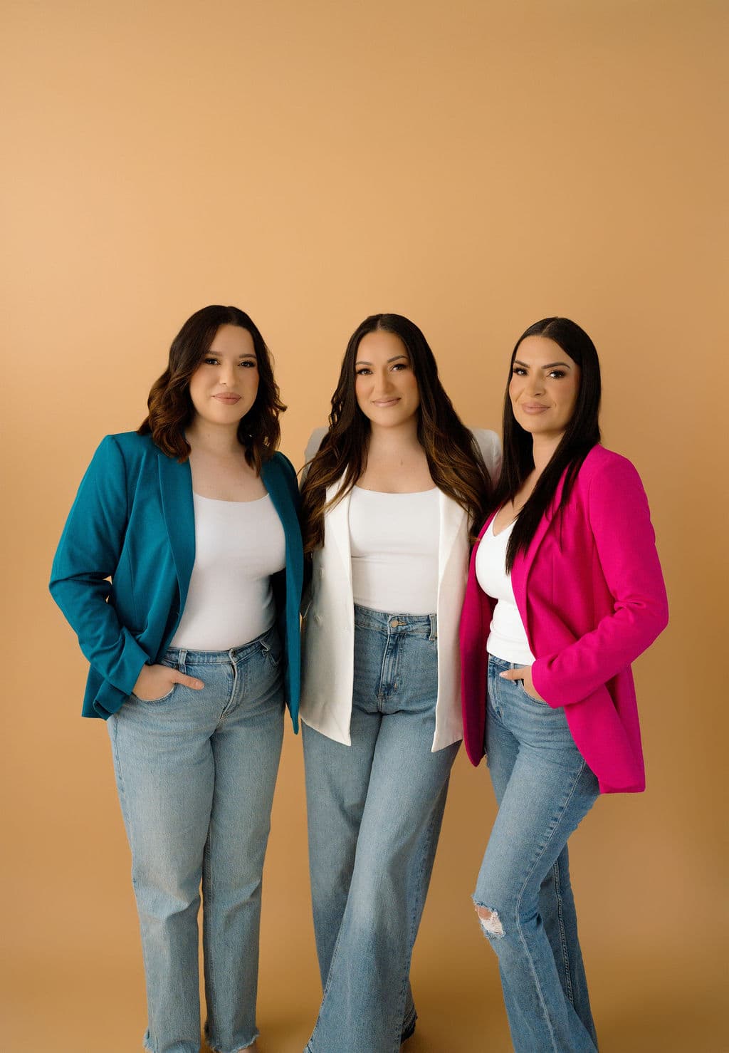 Bride and groom portrait with illuminated LOVE marquee letters