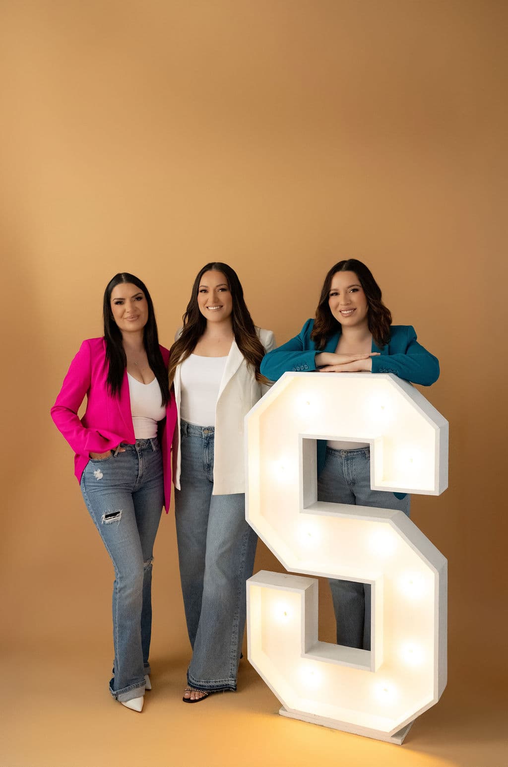 Baby shower display with BABY letters and dessert table