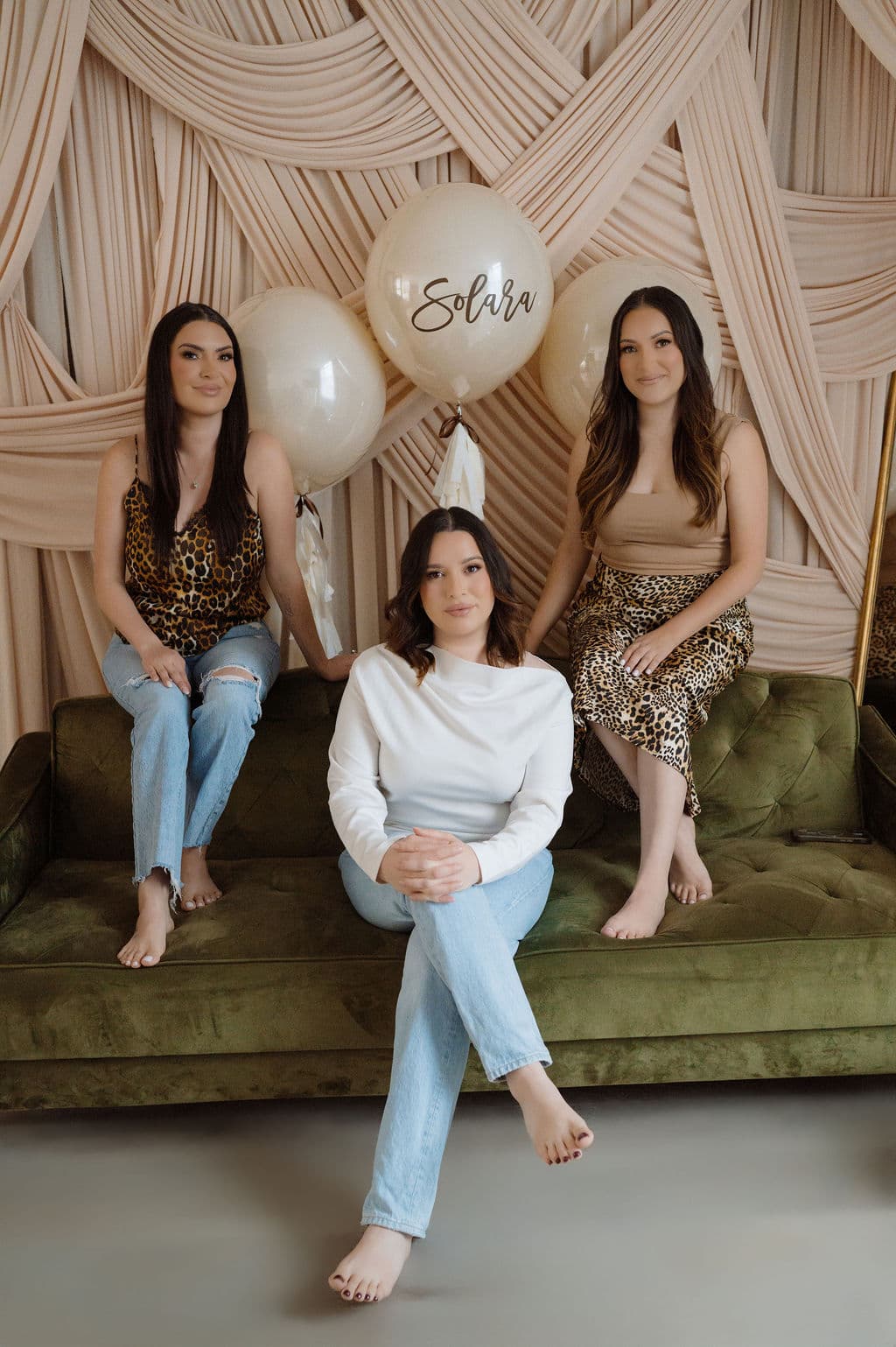 Corporate gala stage styled with custom marquee initials